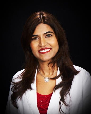 Portrait of Nisha Sarwath, the registered nurse and medical esthetician who owns Nisha Skin Spa.